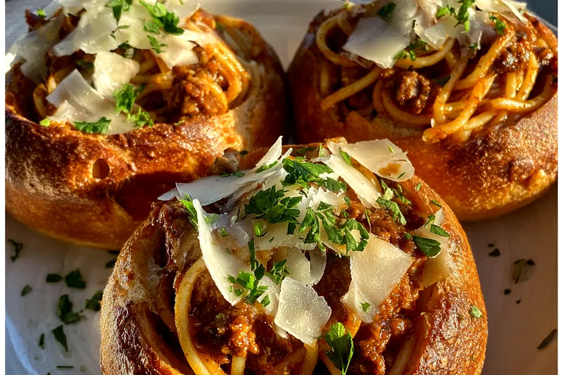 Cooking process for Cheesy Spaghetti Bread Bowls
