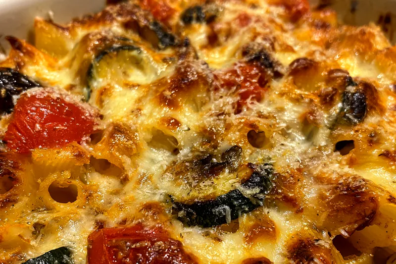 Cooking process for Golden Cheesy Vegetable Pasta Bake in an oven-safe skillet