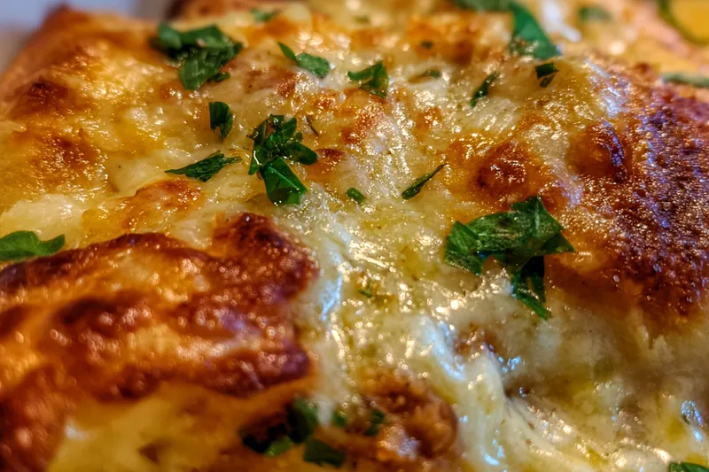 Cooking process for Savory Cheese Topped Steak