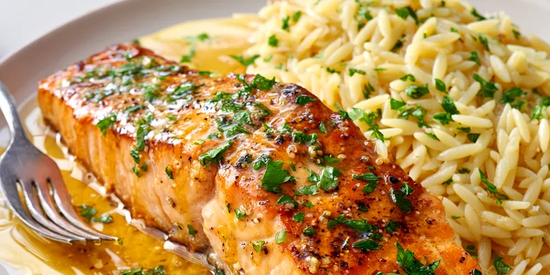 Seared Salmon with Lemon Orzo on a plate